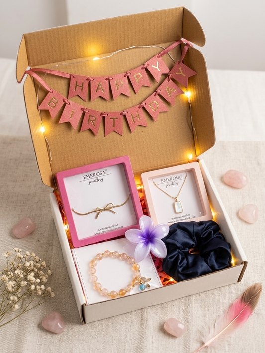Gift box with jewelry and accessories, featuring a 'Happy Birthday' banner.