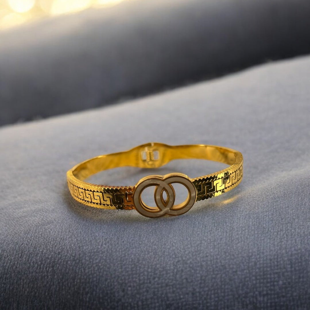 Designer Cuff Bracelet with Entwined Hoops Emerosa Jewellery