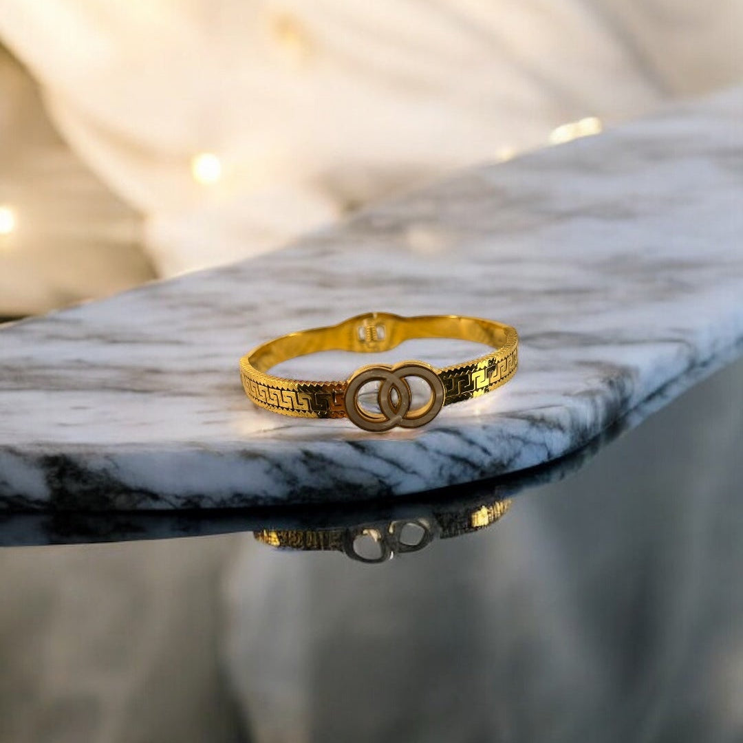 Designer Cuff Bracelet with Entwined Hoops Emerosa Jewellery