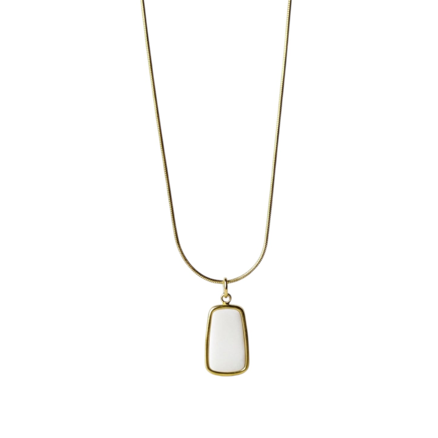 Necklace with a white pendant and gold chain on a white background
